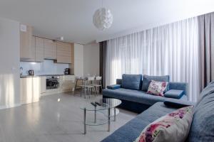 Kuchyň nebo kuchyňský kout v ubytování Resort Apartamenty Klifowa Rewal 19