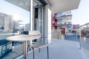 Balkón nebo terasa v ubytování Resort Apartamenty Klifowa Rewal 19