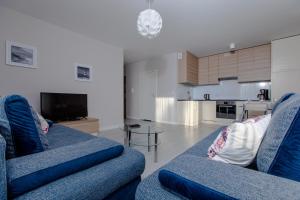 Kuchyň nebo kuchyňský kout v ubytování Resort Apartamenty Klifowa Rewal 19