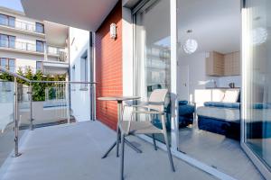 Balkón nebo terasa v ubytování Resort Apartamenty Klifowa Rewal 19