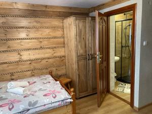 Posteľ alebo postele v izbe v ubytovaní Willa Dziubas z jacuzzi & sauną