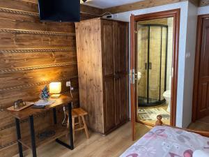 Posteľ alebo postele v izbe v ubytovaní Willa Dziubas z jacuzzi & sauną