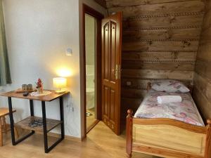 Posteľ alebo postele v izbe v ubytovaní Willa Dziubas z jacuzzi & sauną