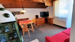 A television and/or entertainment centre at Haus Elfi