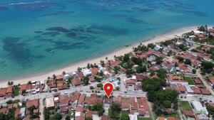an aerial view of a beach with a red marker at Casa Cultural Tubiba Hostel in Tamandaré