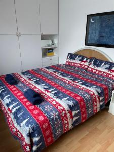 Postel nebo postele na pokoji v ubytování Piancavallo Appartamento con vista zona centrale + 15 fotografií