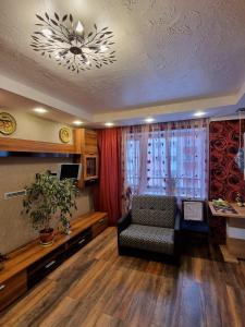 Et tv og/eller underholdning på Margo-Apartament