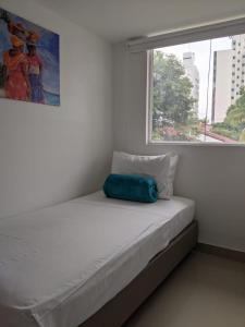 Postel nebo postele na pokoji v ubytování Hotel ITACO