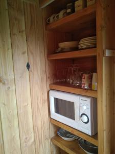 Kuchyň nebo kuchyňský kout v ubytování Chalet Le Paradou Adults only