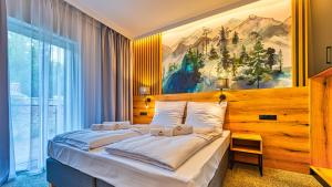 Posteľ alebo postele v izbe v ubytovaní Apartamenty VIP Centrum - Wczasowa 17 by Royal Aparts