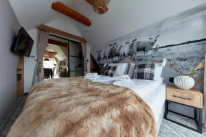 Postel nebo postele na pokoji v ubytování Tatra Square Apartments