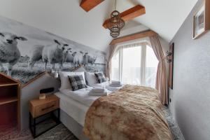 Postel nebo postele na pokoji v ubytování Tatra Square Apartments