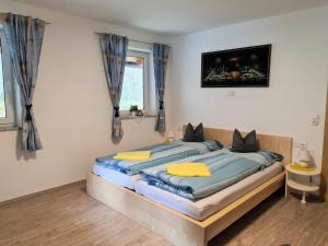 Postel nebo postele na pokoji v ubytování Apartment am Ziller