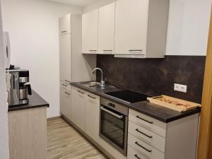Kuchyň nebo kuchyňský kout v ubytování Apartment am Ziller