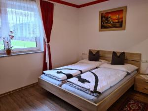 Postel nebo postele na pokoji v ubytování Apartment am Ziller