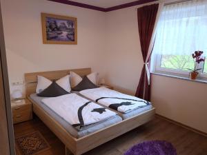 Postel nebo postele na pokoji v ubytování Apartment am Ziller