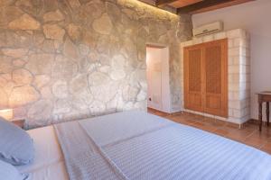 Posteľ alebo postele v izbe v ubytovaní Es turo d Eivissa