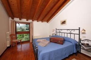 Posteľ alebo postele v izbe v ubytovaní Residence Fondo La Campagnola