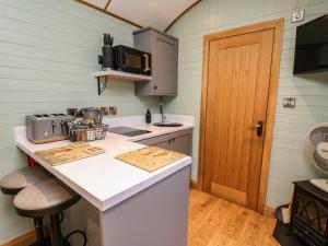 Η κουζίνα ή μικρή κουζίνα στο Highland View +5 φωτογραφίες