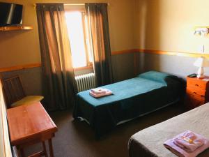 Cama ou camas em um quarto em Hotel Koi Mahik