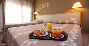 Postelja oz. postelje v sobi nastanitve Hotel Cosmos Tarragona