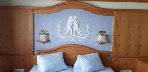 Ein Bett oder Betten in einem Zimmer der Unterkunft Sportpension Alpenrose
