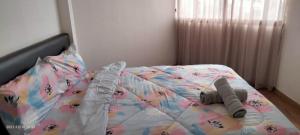 Voodi või voodid majutusasutuse The Barn private home @ Sri Sayang Apartment toas