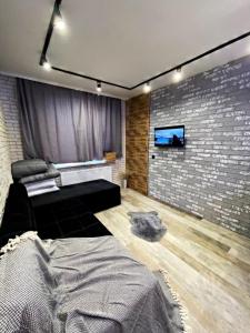 Ένα ή περισσότερα κρεβάτια σε δωμάτιο στο Loft_apartment