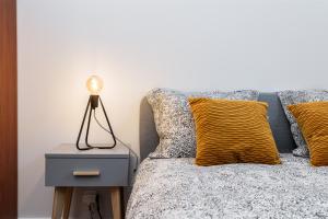Posteľ alebo postele v izbe v ubytovaní St. Florian cozy loft