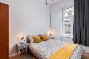 Posteľ alebo postele v izbe v ubytovaní St. Florian cozy loft