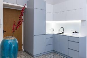 Kuchyňa alebo kuchynka v ubytovaní St. Florian cozy loft + 8 fotografií