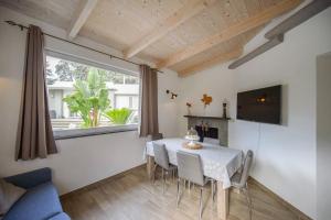 TV a/nebo společenská místnost v ubytování Casa Vacanza M&C Ischia