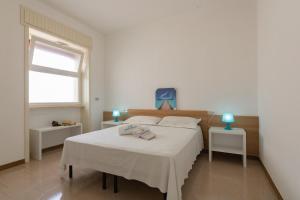Postel nebo postele na pokoji v ubytování VILLA ISCHIA