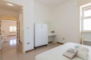 Postel nebo postele na pokoji v ubytování VILLA ISCHIA