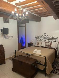 A bed or beds in a room at Affittacamere Mirella