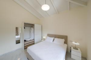 Postel nebo postele na pokoji v ubytování Manazil Mani - Luxury Villas