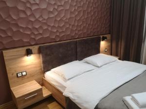 Katil atau katil-katil dalam bilik di Hotel Bereg
