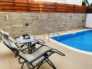 Bazén v ubytování Gaia - 4 Bedroom House in Larnaca nebo v jeho okolí