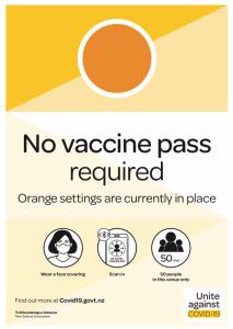 a sign that reads no vaccine pass requiredorange settings are currently in place at HOH - Chalet Frodo in Matamata