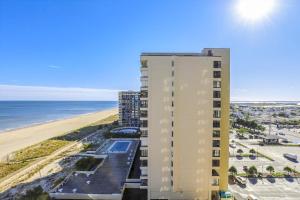 a view of a building and the beach at Sea Watch V in Ocean City