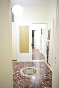Kép Antonia's 2bedroom with garden and private parking by MK szállásáról Pireuszban a galériában