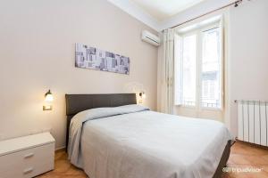 A bed or beds in a room at A Casa di Anna - Apartment