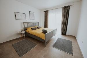 Postel nebo postele na pokoji v ubytování THE NOOK APARTHOTEL