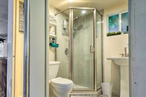 a bathroom with a toilet and a shower at Westminster Studio with Patio Less Than 9 Mi to Beach! in Westminster