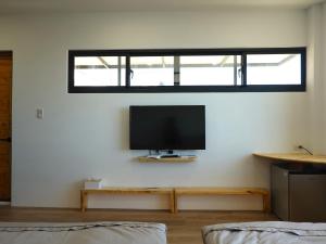 טלויזיה ו/או מרכז בידור ב-Summerflow Hostel