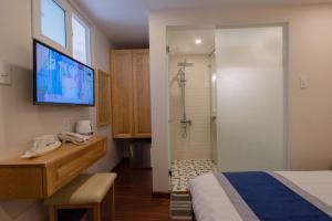 Postel nebo postele na pokoji v ubytování Hotel Bao Duy