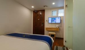 Postel nebo postele na pokoji v ubytování Hotel Bao Duy