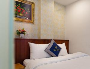 Postel nebo postele na pokoji v ubytování Hotel Bao Duy