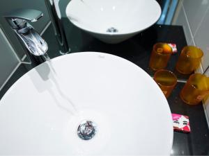 Koupelna v ubytování Motel L Hammarby Sjöstad + 26 fotografií
