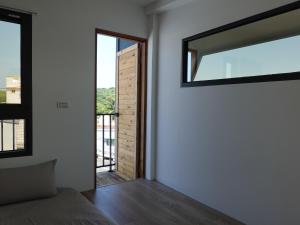 מרפסת או טרסה ב-Summerflow Hostel
